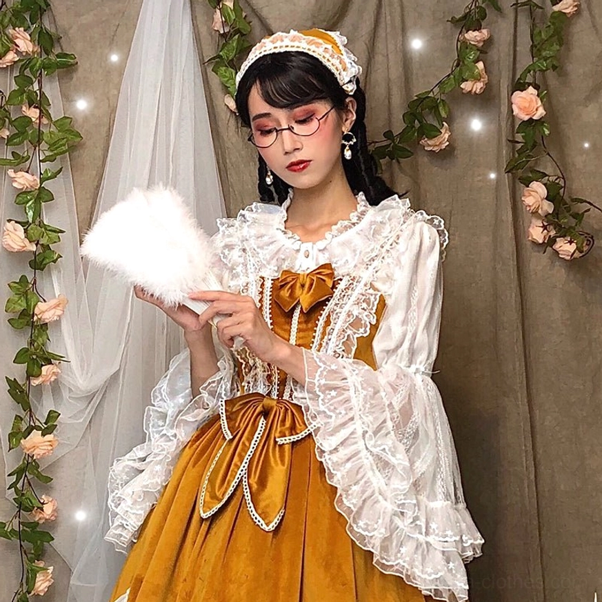 Plus size lolita princess sleeve blouse front view with pleated round neckline and lace trim details worn by model with vintage styling