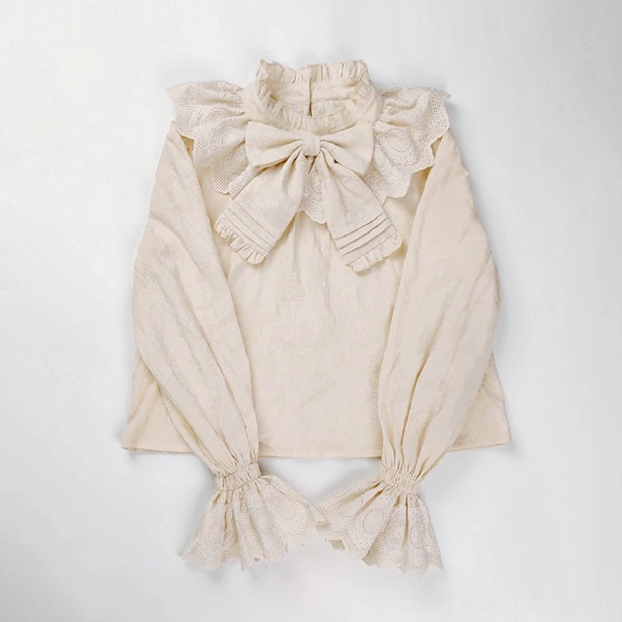 Plus size sweet lolita cotton blouse in ivory cream color with ruffled stand collar and large pleated bow detail flat lay photography