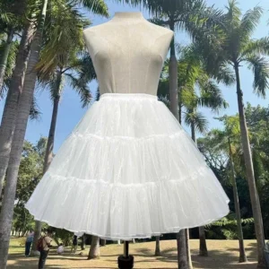 Plus size white daily lolita petticoat full front view on dress mannequin showing elegant two-layer tulle silhouette with tropical outdoor garden setting