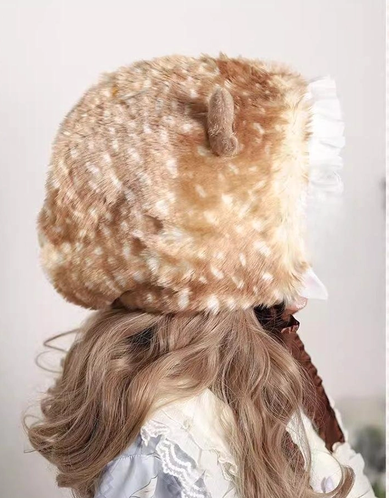 Side back view of brown spotted plush deer ear headdress showing single fuzzy ear horn, adjustable tie strap, and soft plush lining for warmth