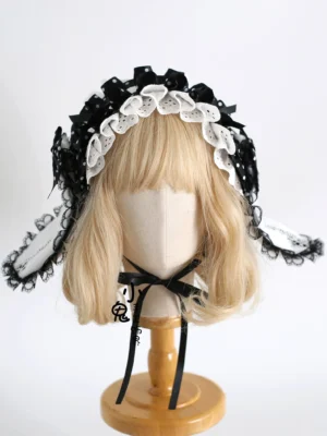 polka dot lolita bunny ear headband with detachable ears front view mannequin display black white polka dots ruffled lace trim
