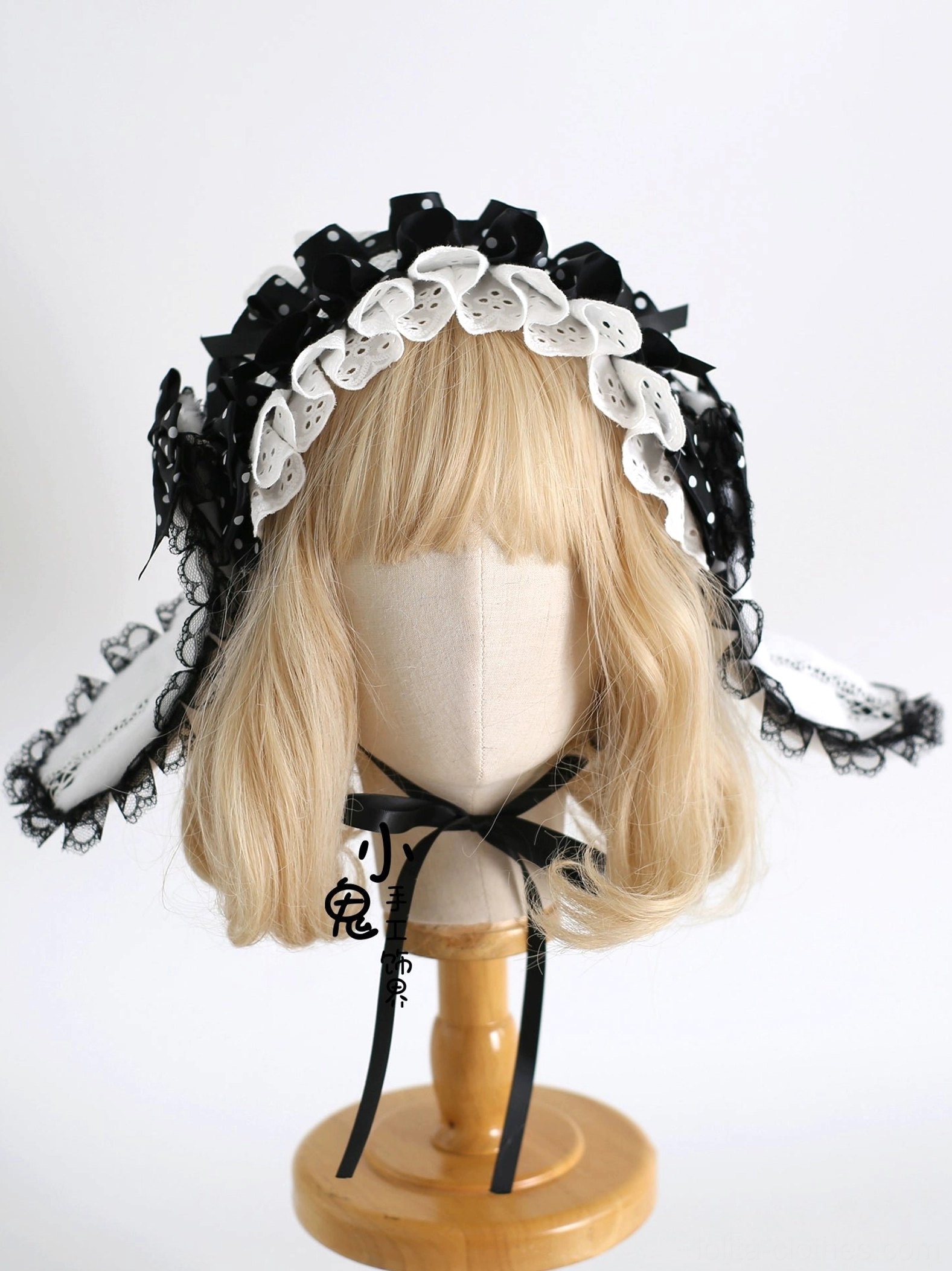 polka dot lolita bunny ear headband with detachable ears front view mannequin display black white polka dots ruffled lace trim