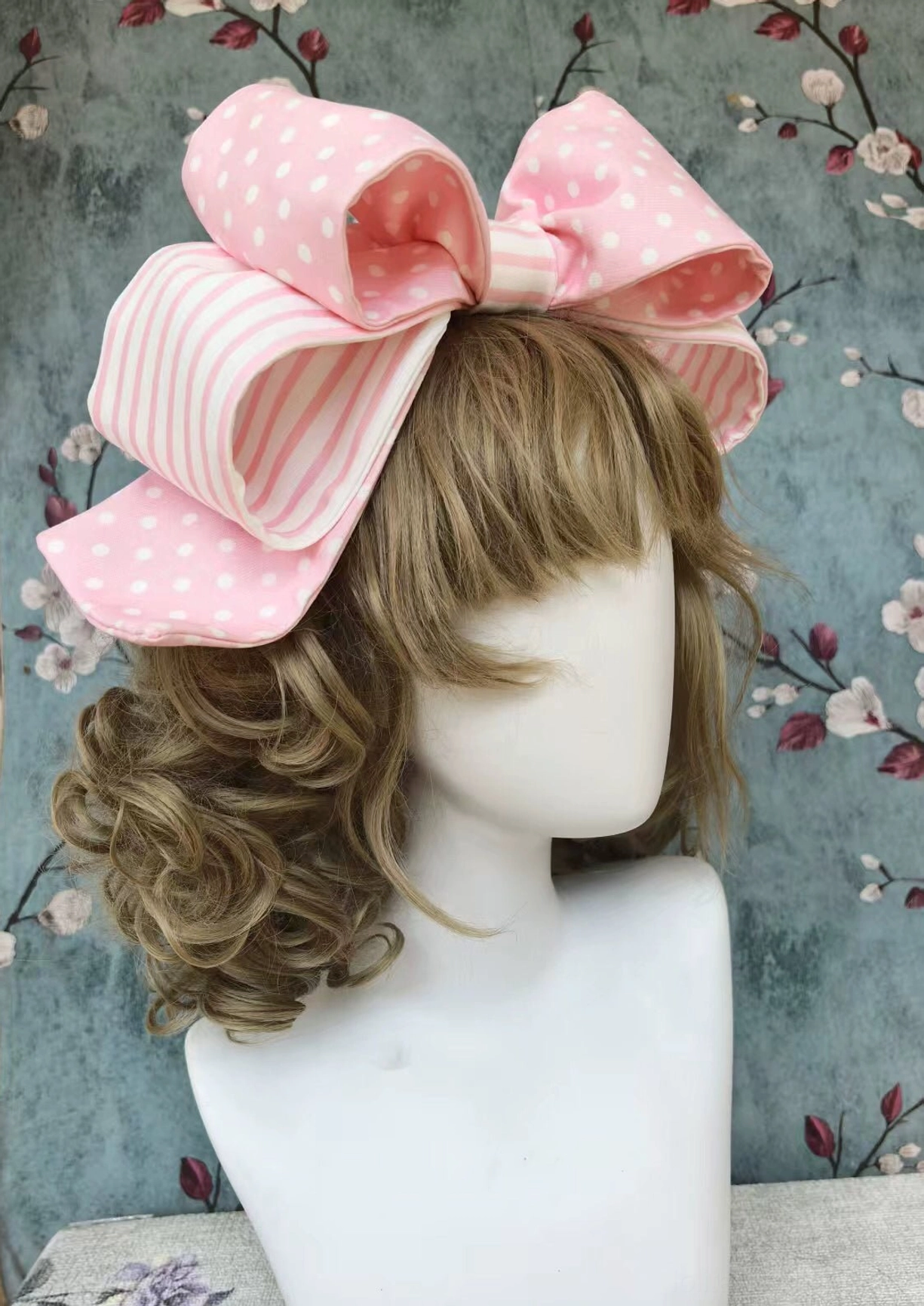 Flat lay of lolita poodle embroidered brooch hair clip accessories in black and pink tones with mini bow embellishment, matching poodle lolita dress series
