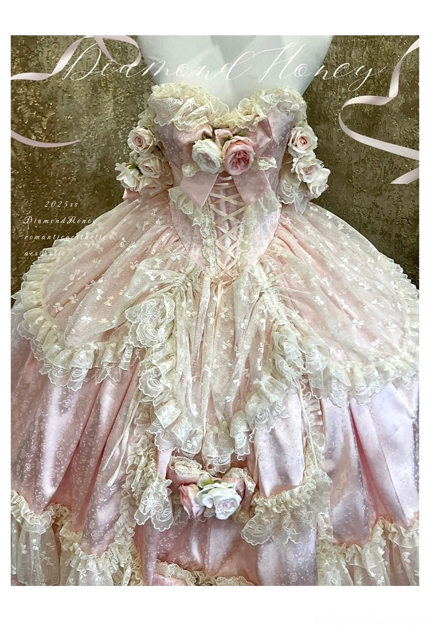 Front view of pastel pink princess bridal lolita gown with tiered tulle and rose embellishments