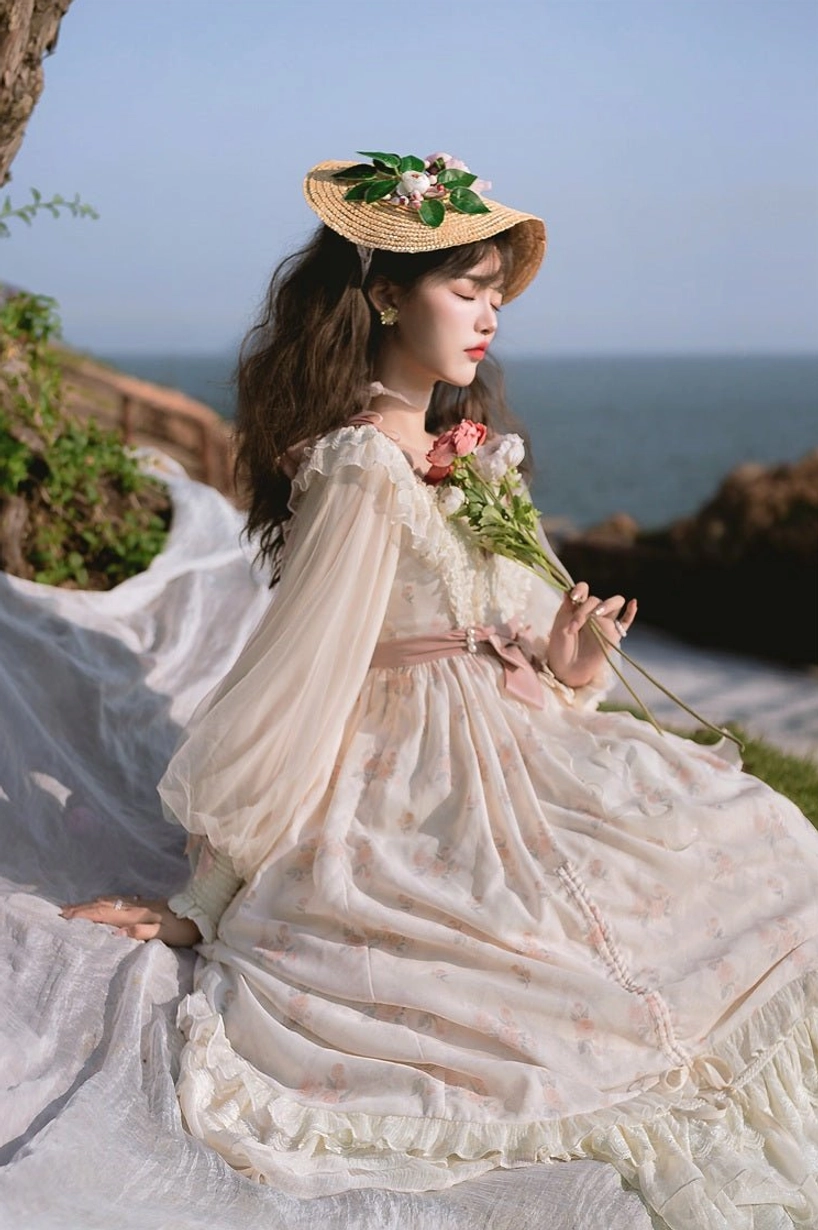 Princess lolita OP dress full front view cream ivory tone with pink accents, puffed sleeve details, flared multi-layer skirt, complete elegant silhouette princess aesthetic