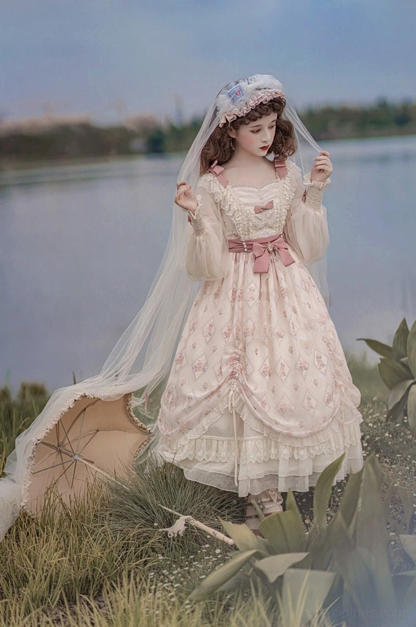 Princess lolita OP dress neckline detail showing ruffled square neckline trim, cream ivory base, delicate construction, modest neckline aesthetic characteristic of princess lolita style