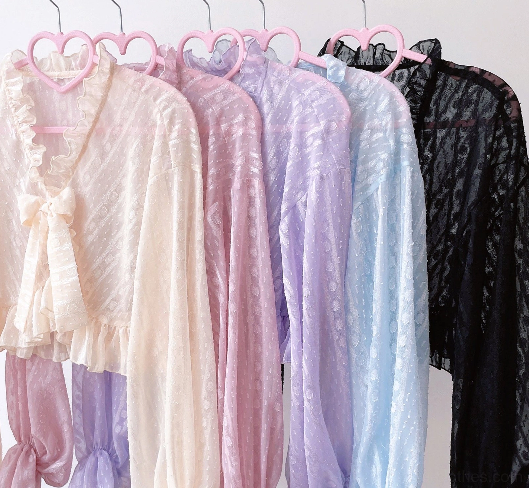 Puffed sleeve detail of sweet Lolita chiffon cardigan showing gathered romantic silhouette and craftsmanship