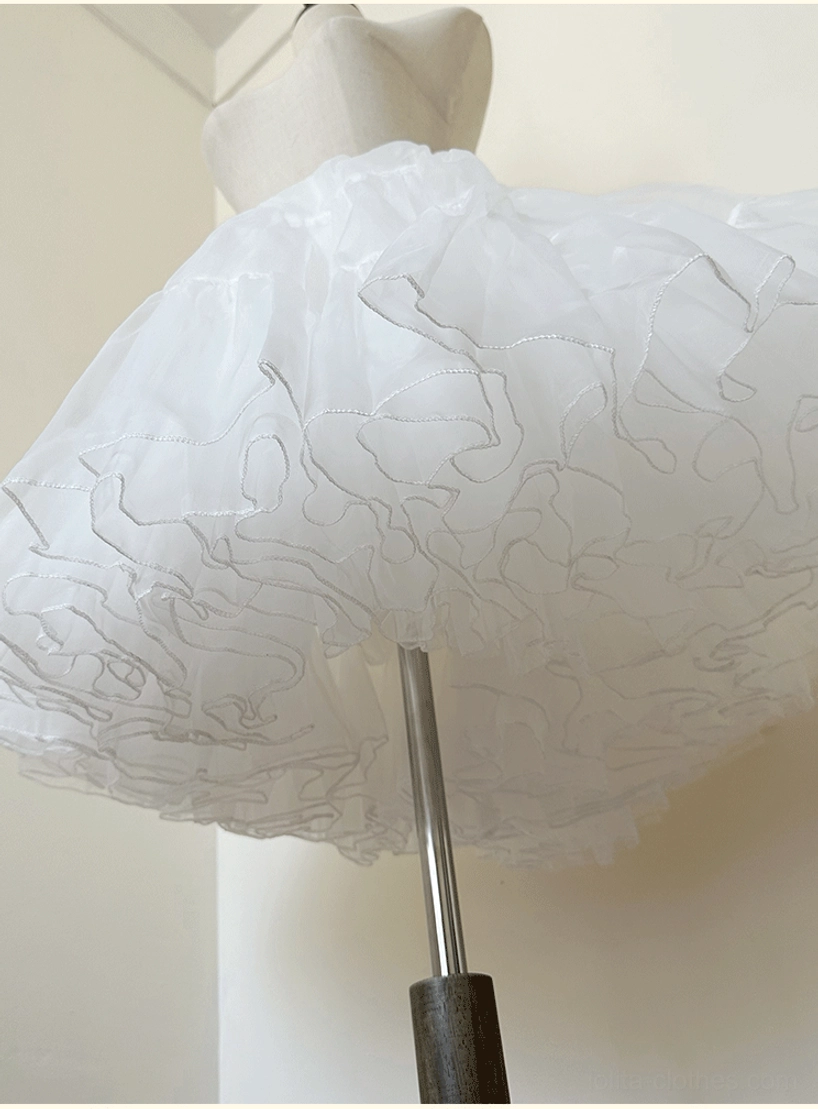 Four-layer puffy lolita petticoat side detail close-up view showing thick layered sheer tulle and soft bouncy puff shape construction