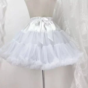 White fluffy lolita underskirt side front close-up showing smooth satin waist section and layered tulle construction with ruffled bottom edge detail