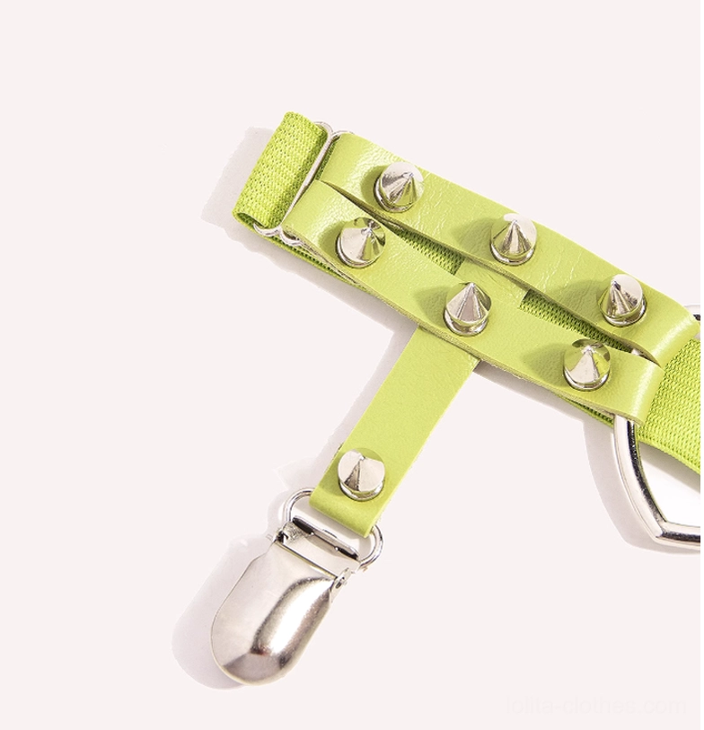 Close-up side view of green Punk Lolita rivet stocking garter clip with adjustable strap and metal clasp