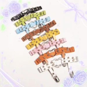 Light coffee Punk Lolita heart rivet adjustable stocking garter clips displayed in a flat lay