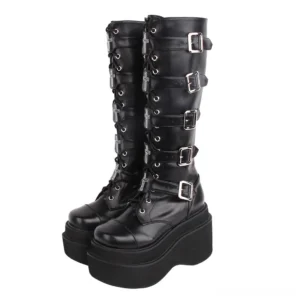 punk lolita platform boots with silver buckles and cross embroidery black patent leather front three quarter view
