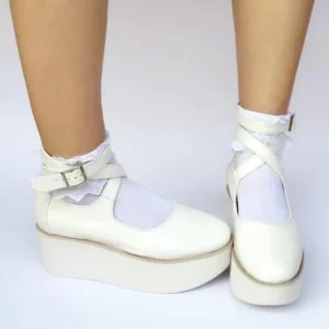 Front direct view of crisscross ankle strap lolita platform shoes on feet with frilled white socks, featuring adjustable dual straps and flat platform midsole