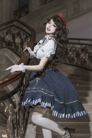 Punk lolita two-piece coordinate - side profile view showing brown corset waistband with metal accents, ruffled short-sleeve blouse, and navy embroidered skirt with striped hem detail