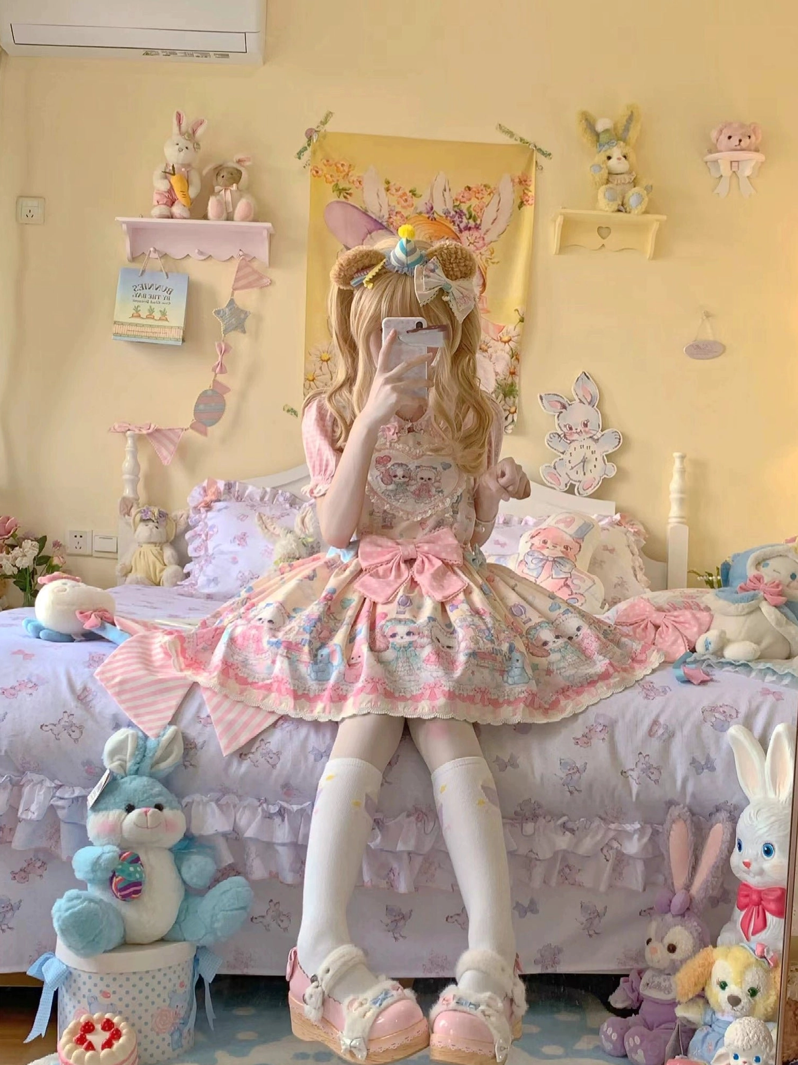Puppy Lolita salopette waist area showing detachable pink polka dot bow and convenient side pocket practical Sweet Lolita design features
