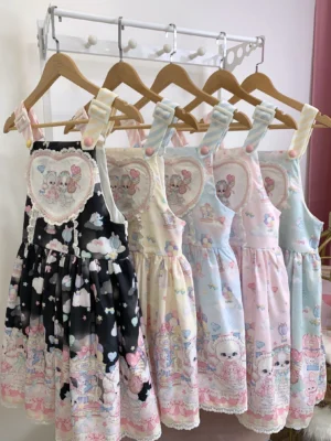 Puppy Dreams Sweet Lolita salopette JSK in multiple pastel color options including pink mint green blue light yellow and black pink hung on wooden hangers overhead display view