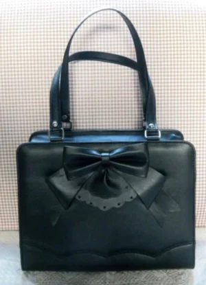 Pure black Lolita PU structured handbag with matching bow and lace cutout front decoration