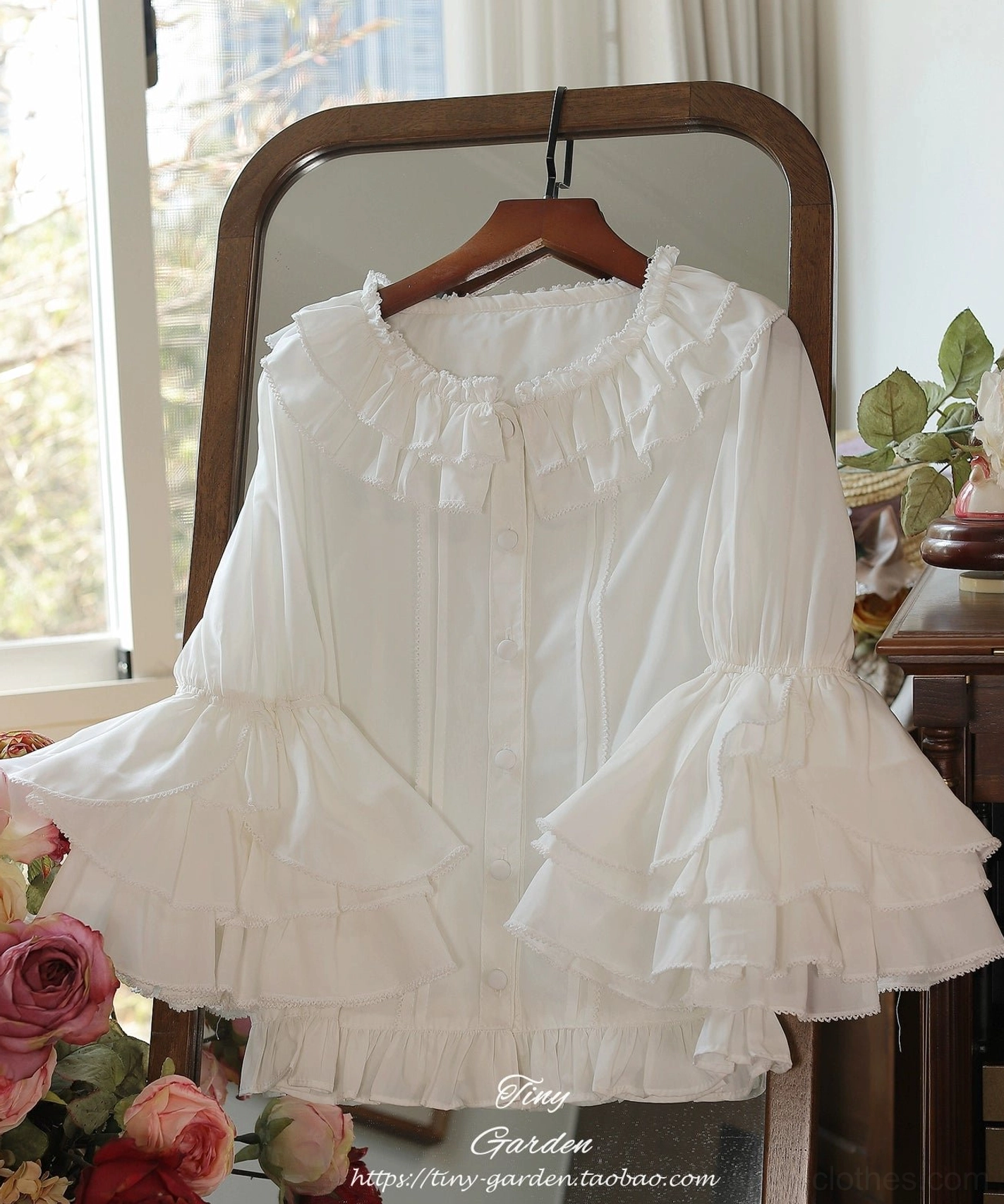 Pure white ruffled collar lolita blouse with round ruffled collar and double-layered bell sleeves, hanging front display with window and flower background, classic lolita elegance