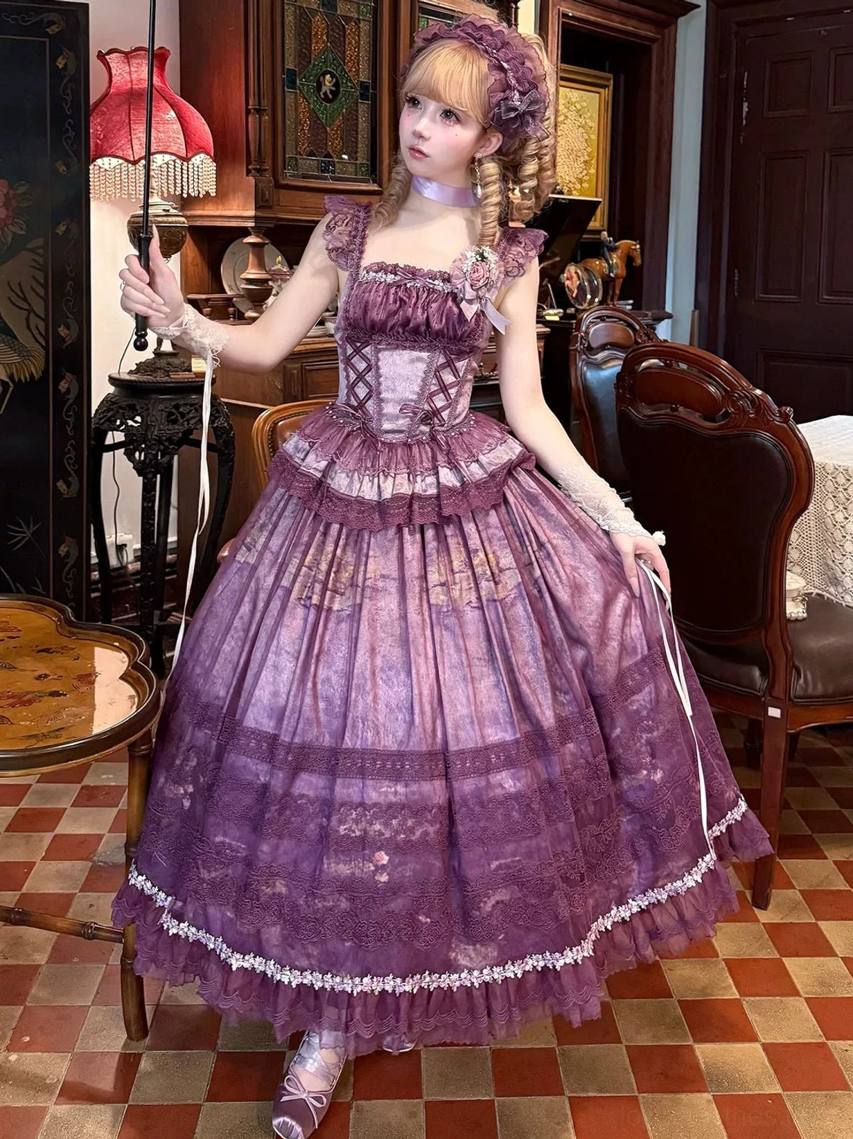 Purple classic lolita two-piece set with fishbone bodice and maxi skirt, featuring open shoulder design and sheer overlay hem, worn with hair accessory in vintage dining room setting