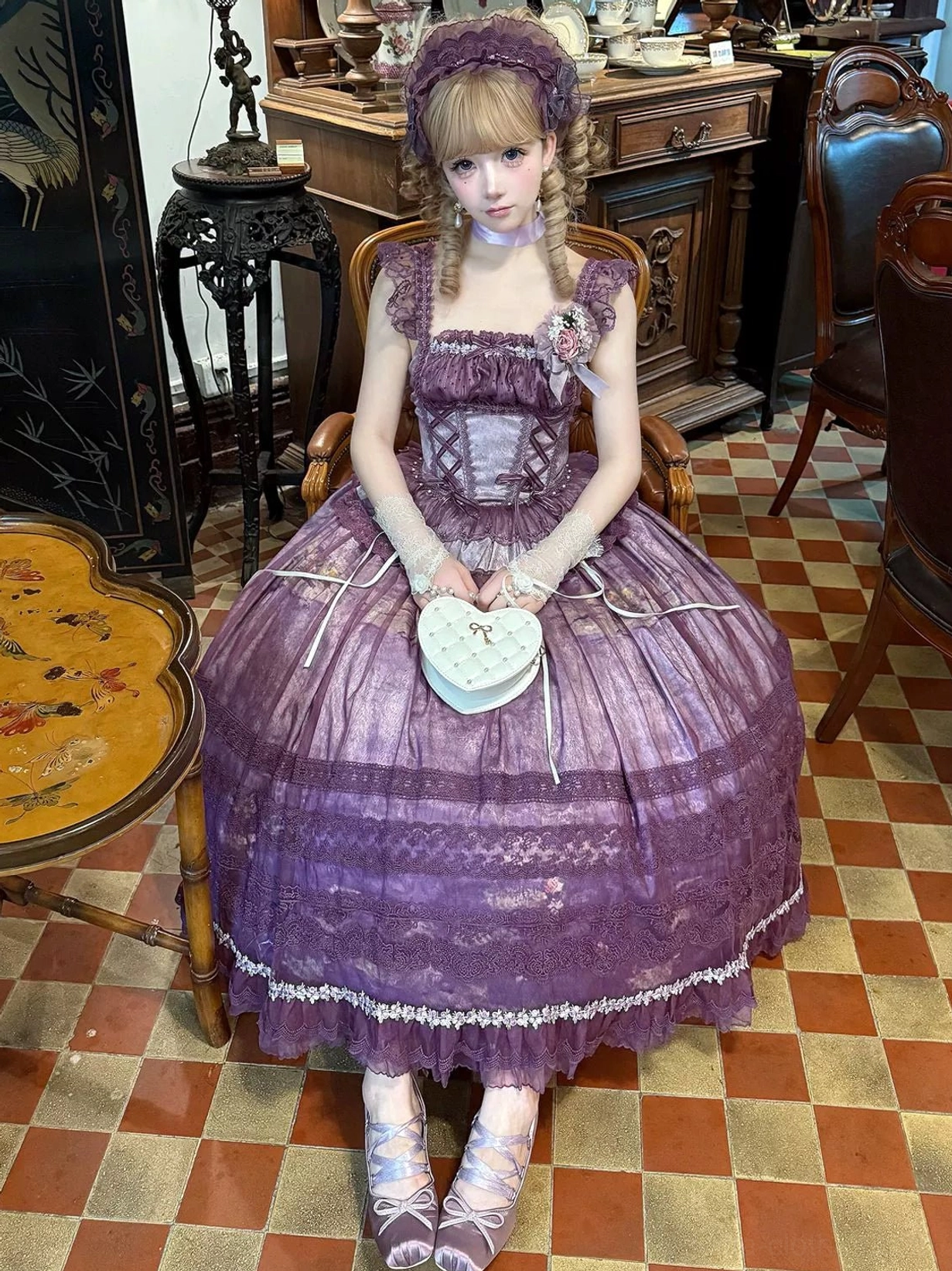 Purple classic lolita two-piece with square neck boned bodice, heart-shaped handbag accessory, and white ribbon lace hem trim on maxi skirt with hair accessory