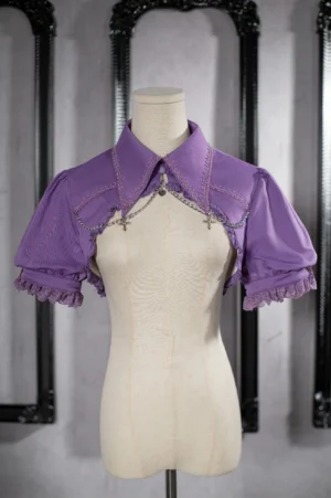 Purple gothic puff sleeve bolero shrug with lace trim and metal chain decoration fashion display