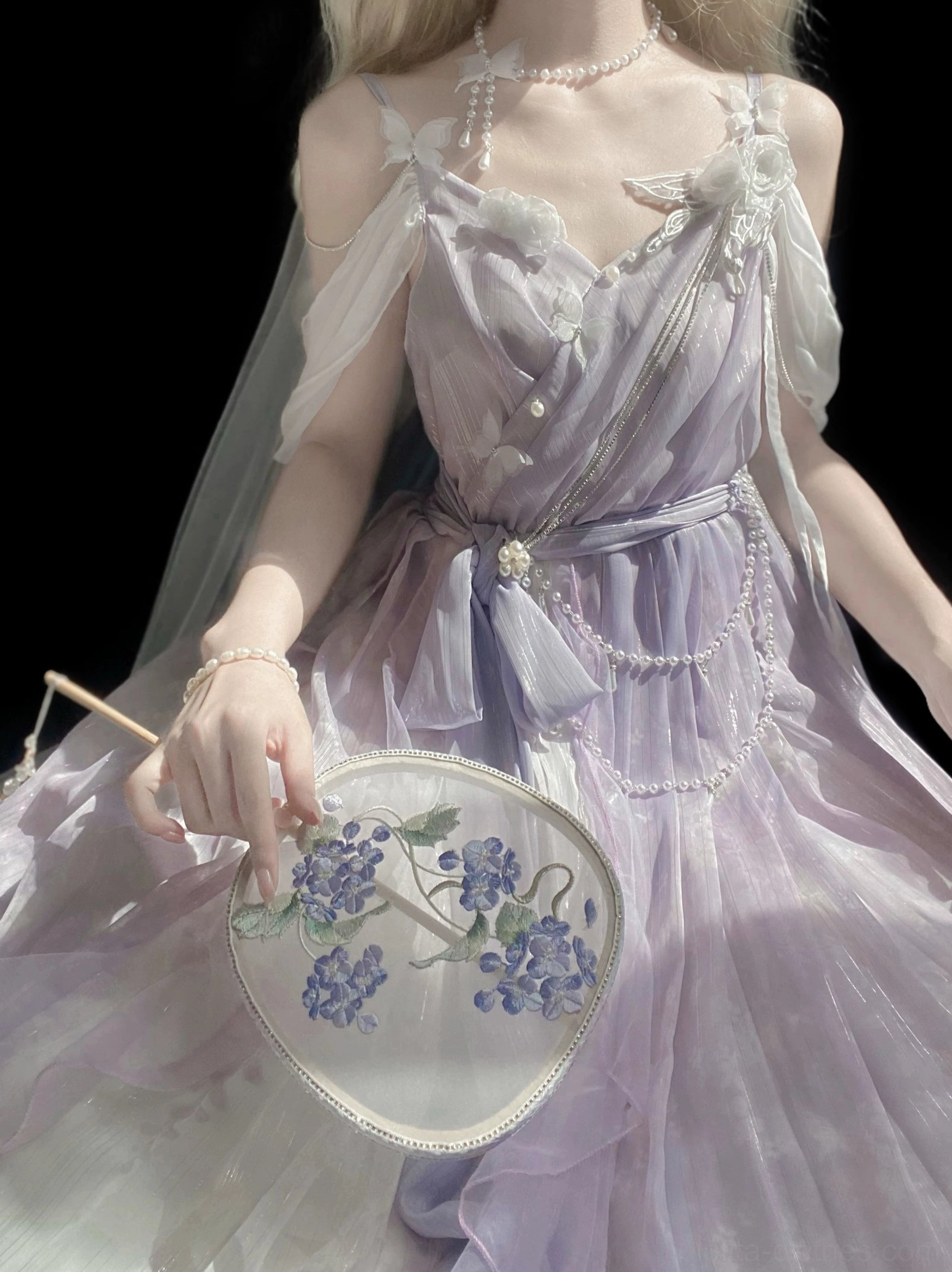Detailed close-up of purple Lolita JSK butterfly and floral chain shoulder decoration embellishments