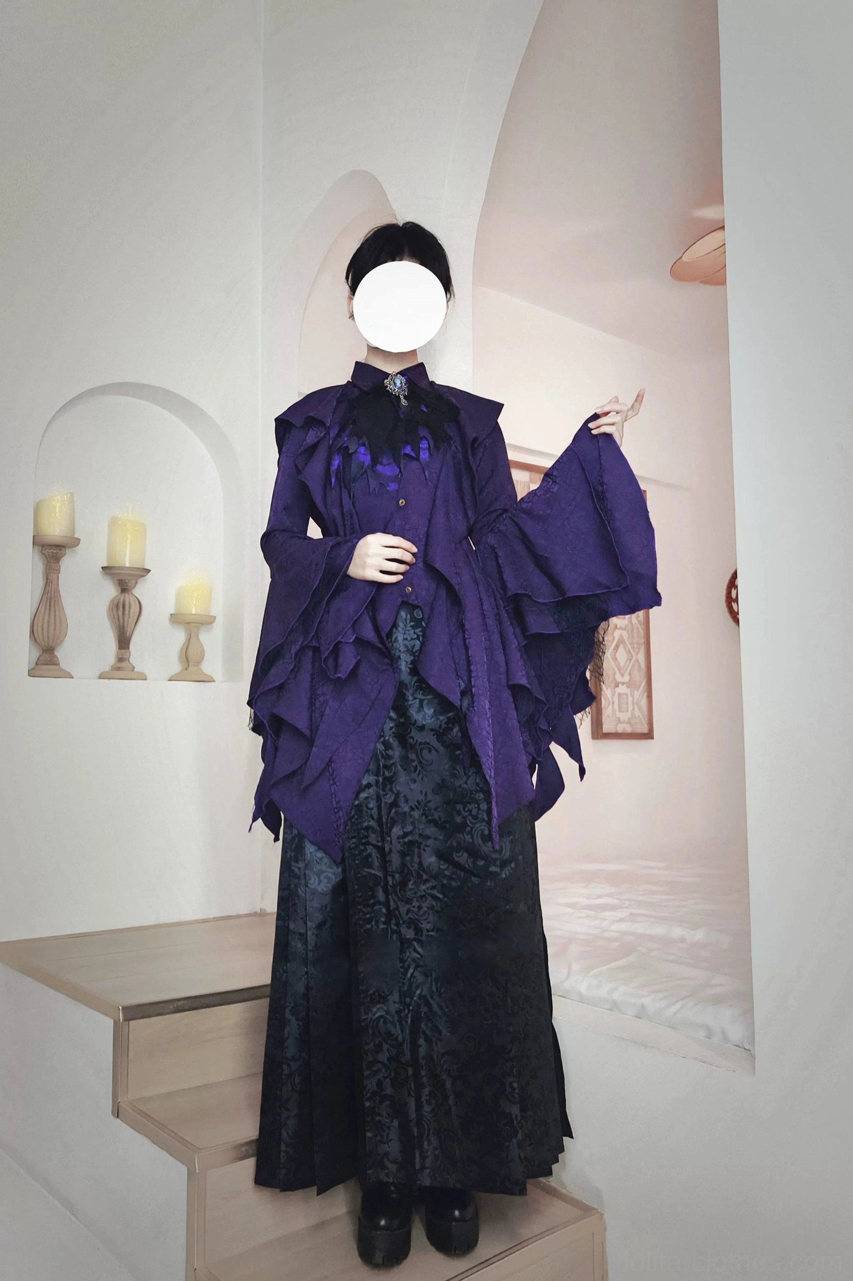 Model wearing purple Ouji Lolita formal set with ruffled flared sleeves, gothic stand collar details, paired with dark jacquard long skirt, minimalist home studio backdrop