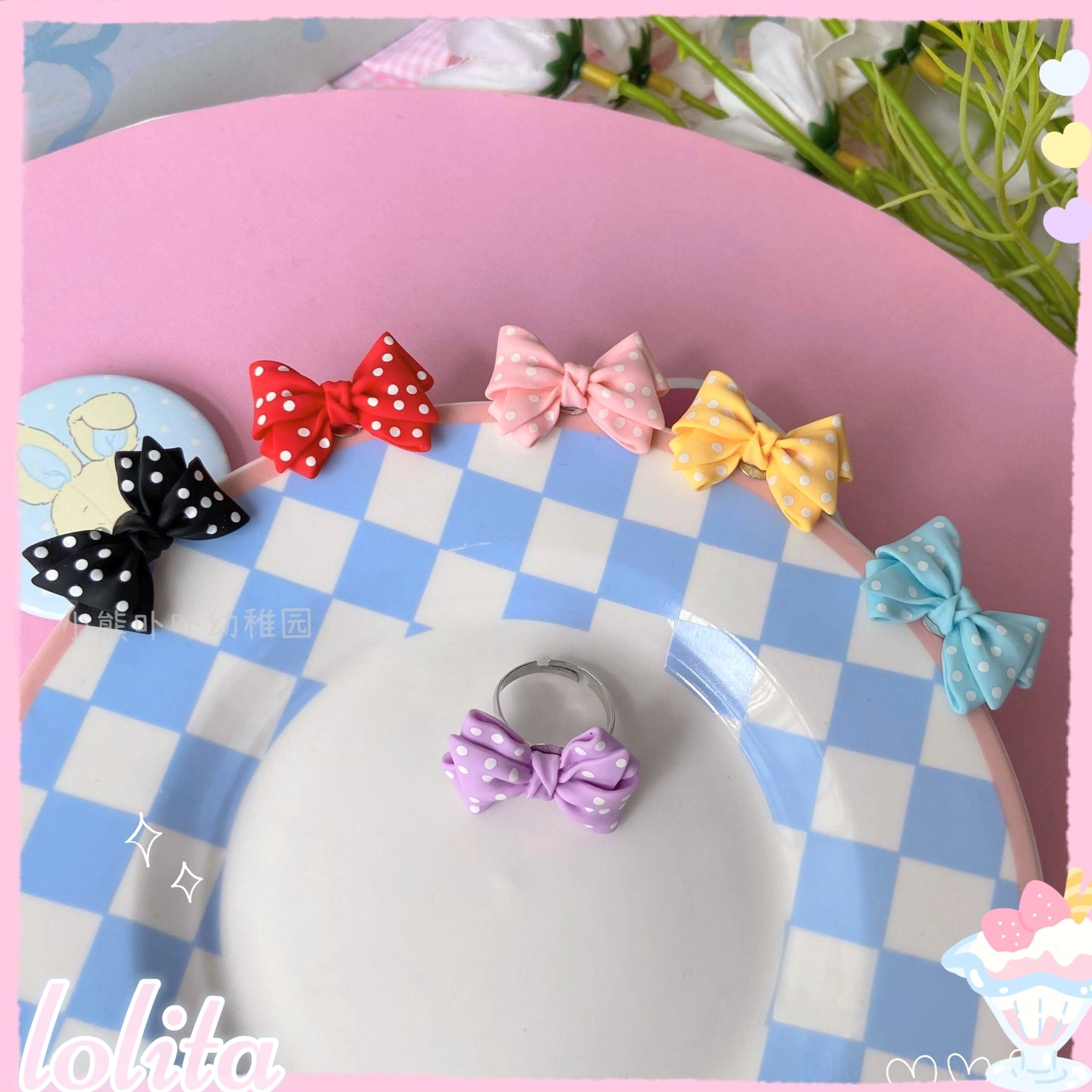 Purple pastel sweet lolita bowknot adjustable ring featuring prominent bow motif and heart-shaped resin accents for cute kawaii fashion coordination