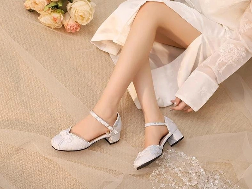 White Qi Lolita Mary Jane chunky heel sandals overhead crossed legs delicate floral embroidery anchor strap
