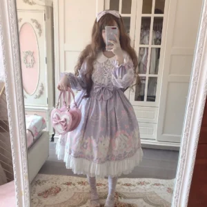 Sweet Lolita girl in pastel purple rabbit print one-piece dress with long puffed sleeves, lace-up bodice, ruffled skirt hem, wearing rabbit print headband, mirror selfie front pose