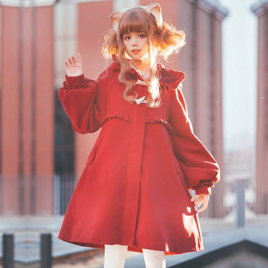 Red burgundy lolita hooded winter coat with cat ear shaped hood ruffled trims lantern sleeves horn toggle closure single model outdoor urban area