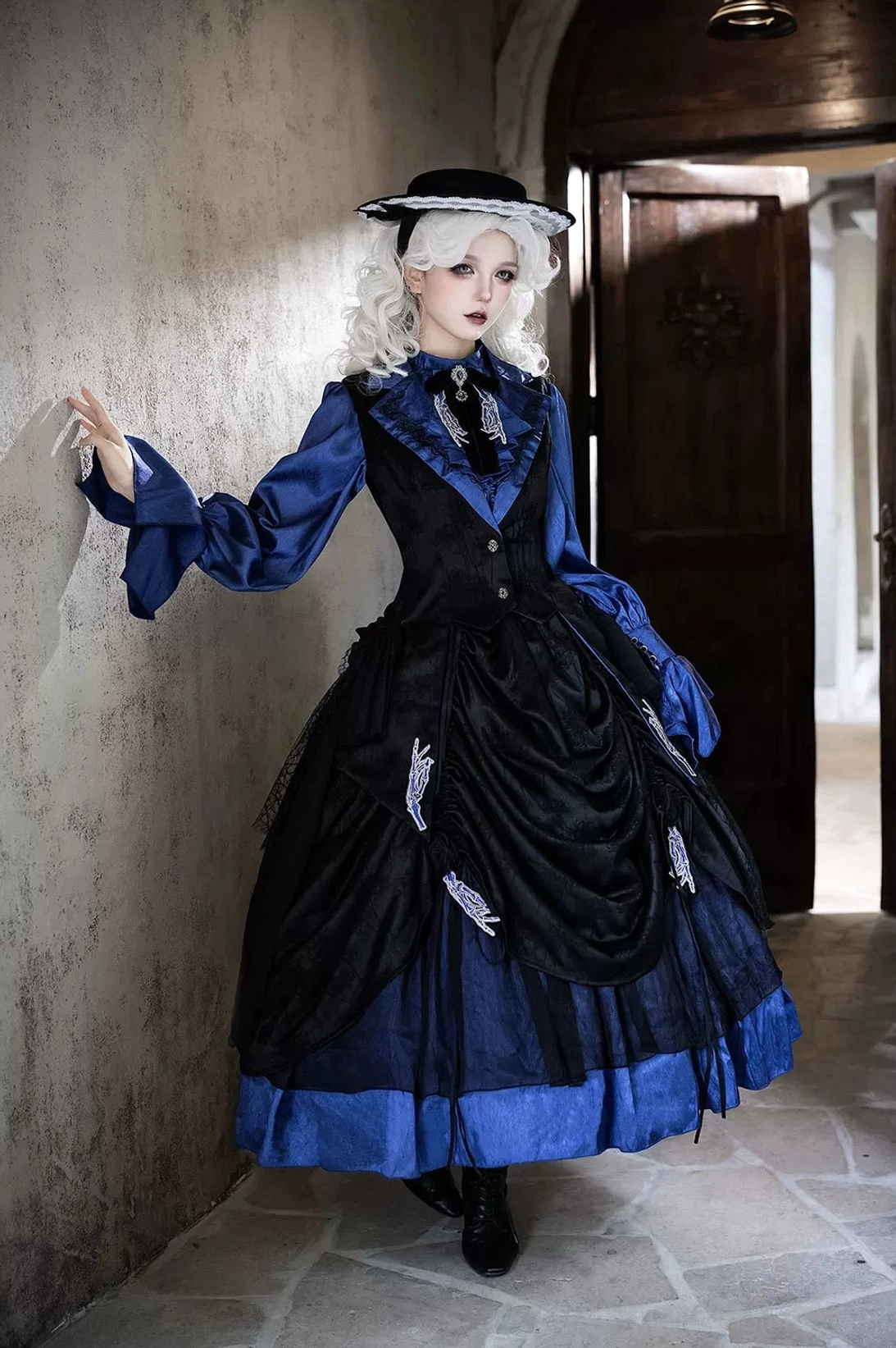 Red Gothic Lolita vest coordinate with skirt showing color harmony and embroidered details