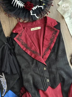 Red Gothic Lolita vest with satin lapel and intricate vine embroidery detail flat lay