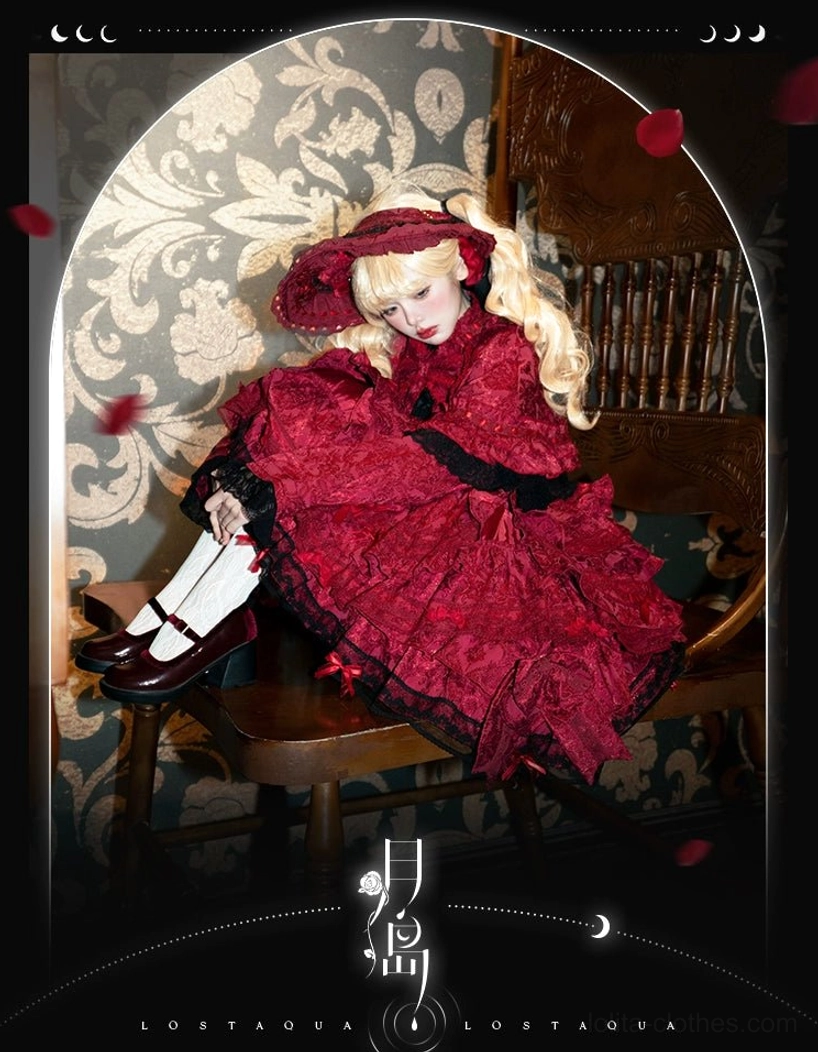 Red vintage gothic lolita cape bonnet set sitting pose full ruffled skirt black waist sash elegant