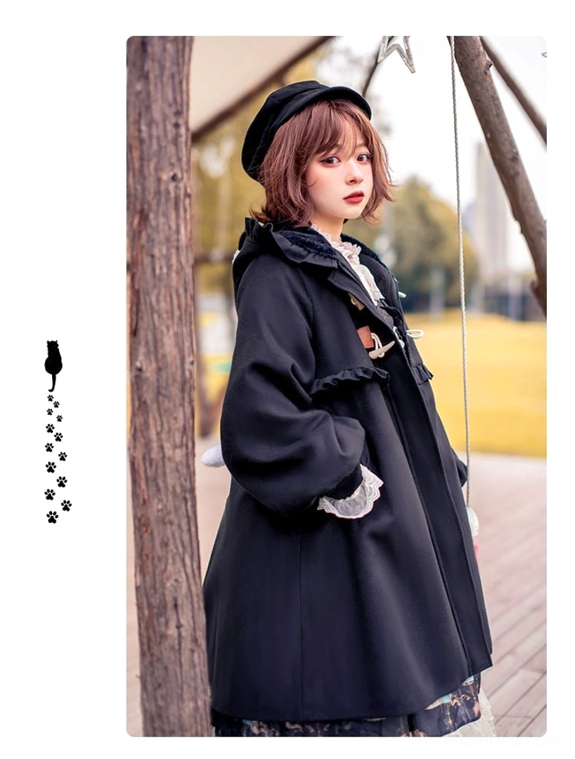 Red lolita winter coat hood detail cat ear shaped construction ruffled trim decorative bow embellishment close view