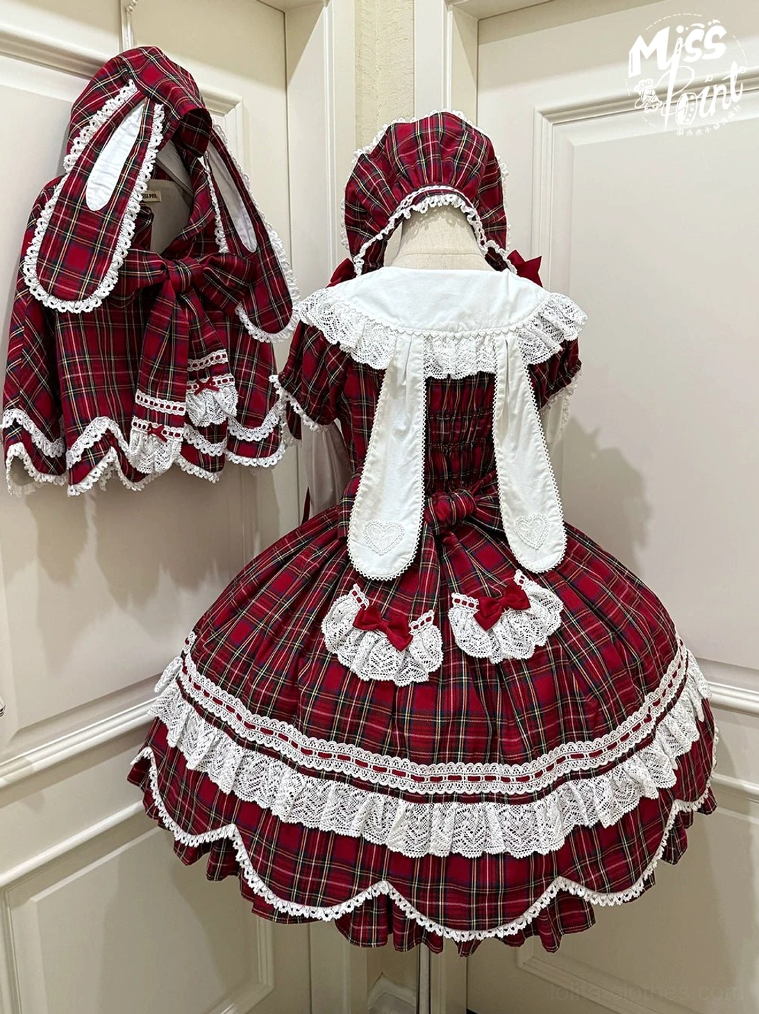 Red plaid lolita dress set with bunny ear capelet and matching bonnet on dress form, white ruffled collar, scalloped lace hem, cute animal ears decoration