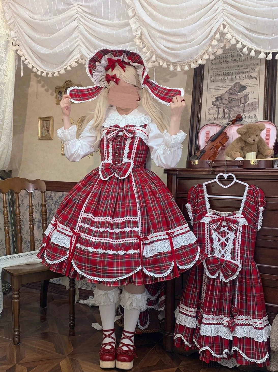 Red tartan lolita JSK dress matching bonnet hanging dress showcase three-quarter shot model vintage study wearing red mary jane shoes white layered lace trim large front bow scalloped skirt edge