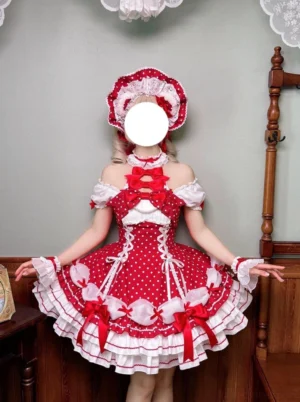 Red polka dot off-shoulder Lolita dress worn by model with matching bonnet and wrist accessories in vintage cafe setting