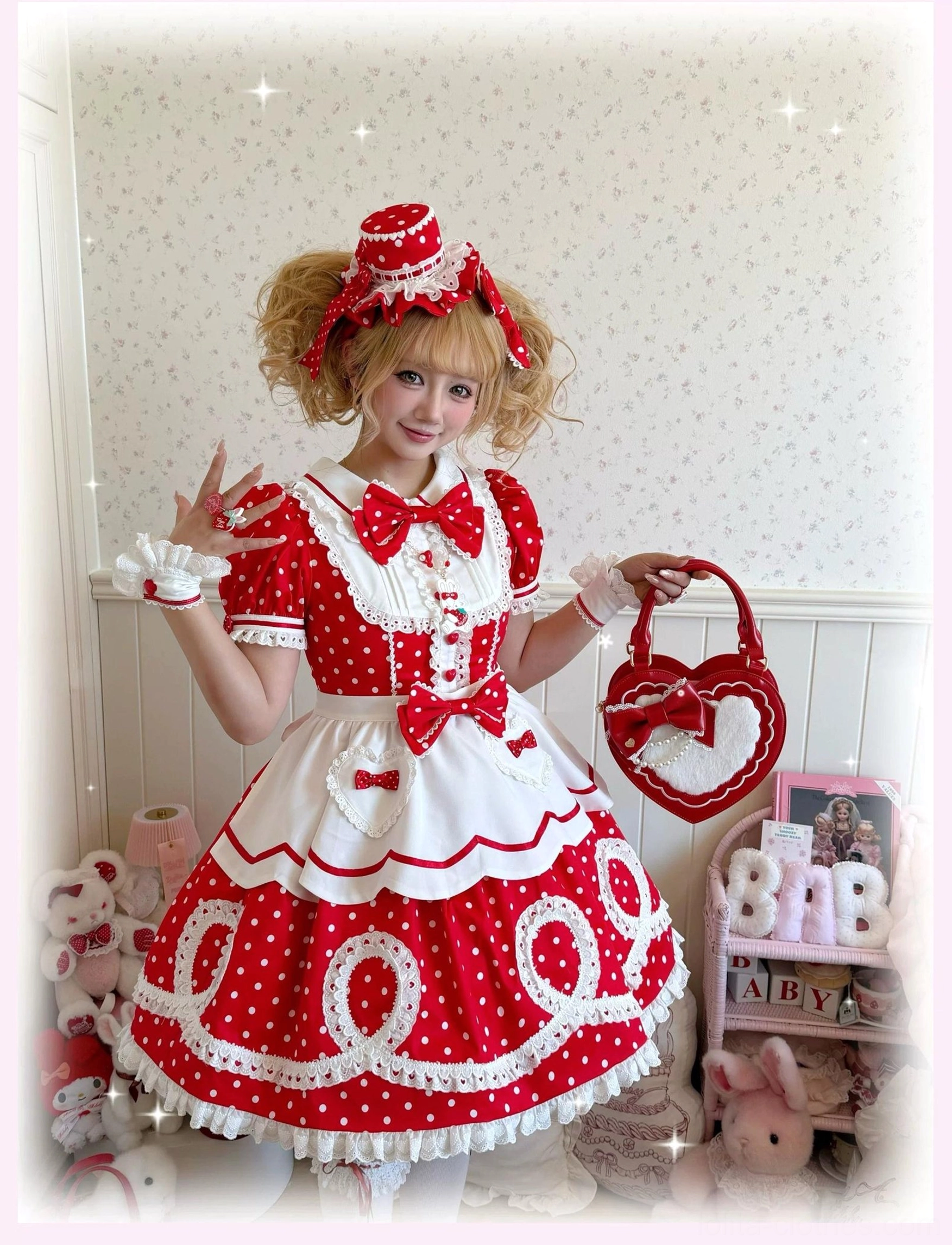 Red polka dot lolita OP dress side view showing vertical silhouette and waist bow on dress mannequin