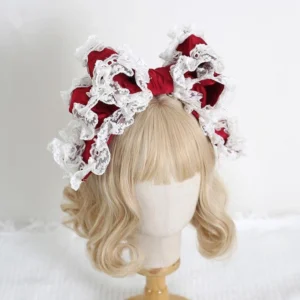 Red satin oversized lace bow sweet lolita KC headband with white ruffled lace trim on blonde wig mannequin overhead view