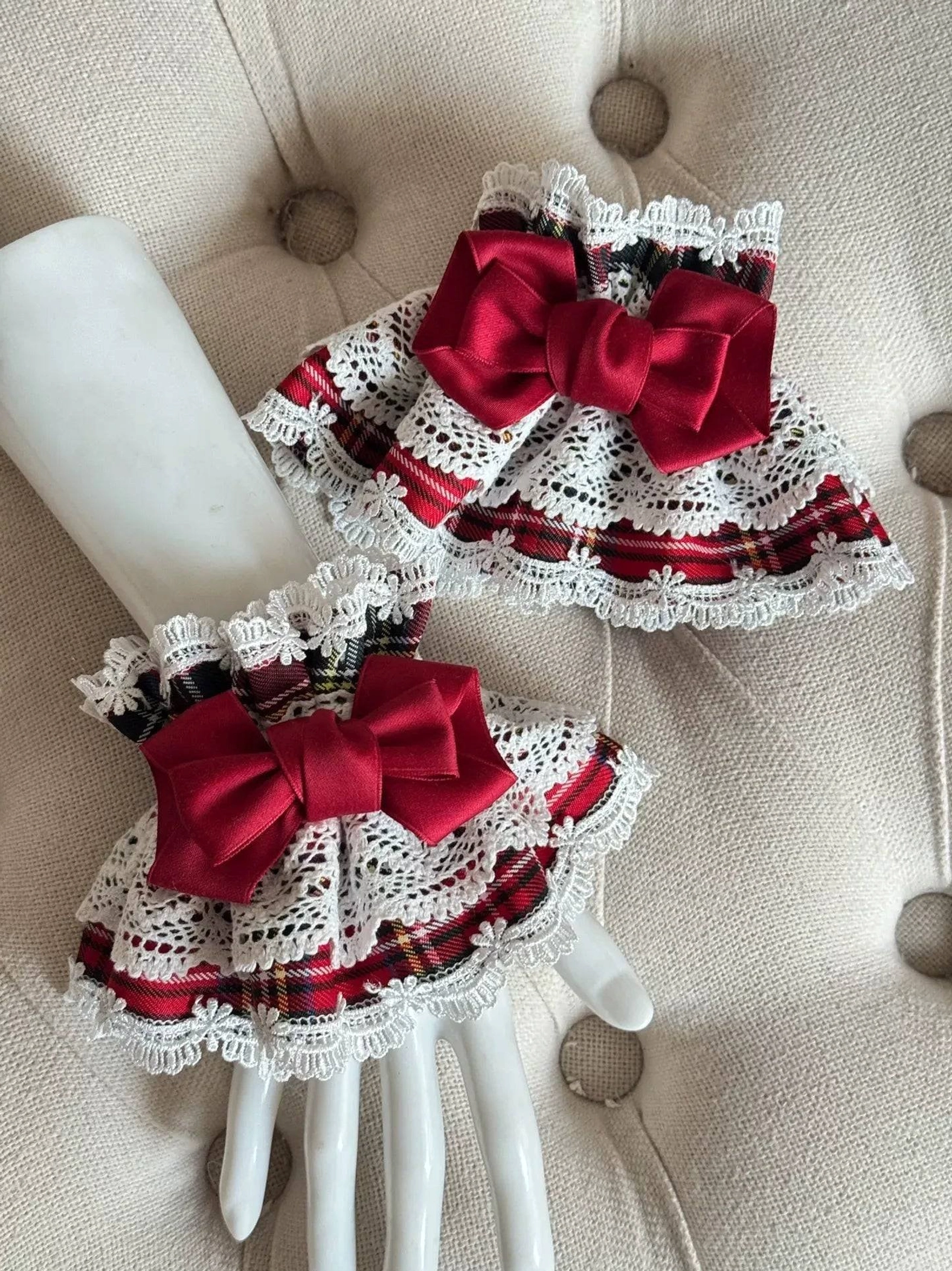 Pair of red tartan Lolita elastic wrist cuffs with cotton-blend fabric, approximately 15cm circumference, custom sizing options available for larger measurements