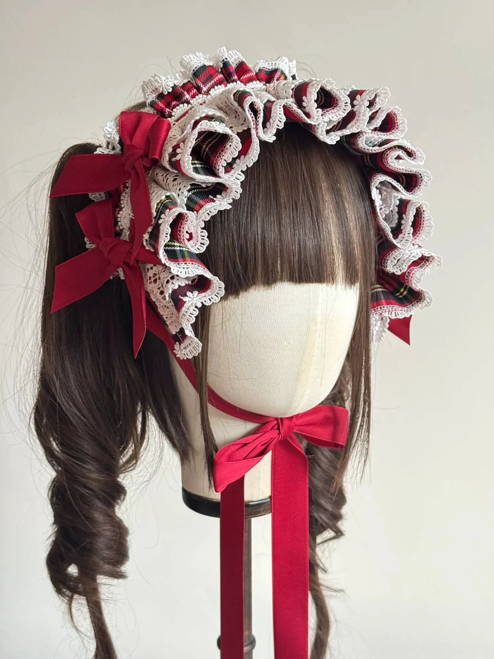 Red tartan plaid Lolita elastic wrist cuffs accessory set showing cotton-blend fabric construction with tartan pattern and finished edges, standard sizing approximately 15cm circumference
