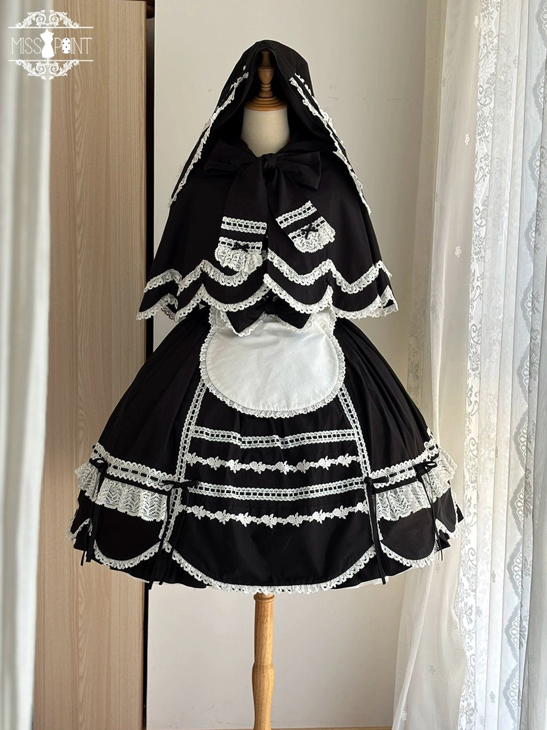 Red vintage petal rabbit lolita cape oversized bunny hood detail close-up kawaii design element