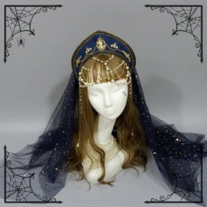 Retro Lolita bead chain headdress with dark blue star-dusted tulle veil displayed on mannequin with brown curly wig, navy velvet base with gold embroidery and pearl forehead tassel chains, front close-up view