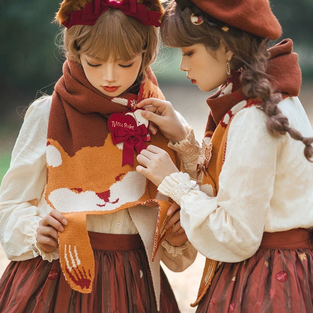 Reversible lolita peter pan collar showing both embroidered forest design side and plaid pattern lining flat lay demonstration