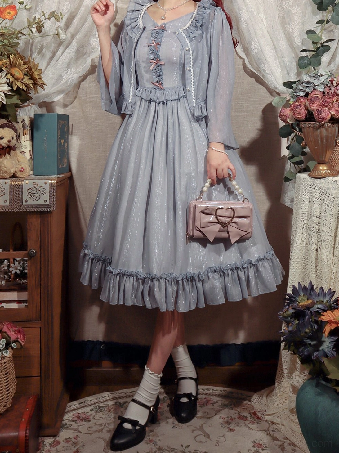 Rhine riverside lolita cardigan back view showing complete ruffled silhouette, waist trim detail, delicate chiffon construction, and authentic lolita coordinate possibilities