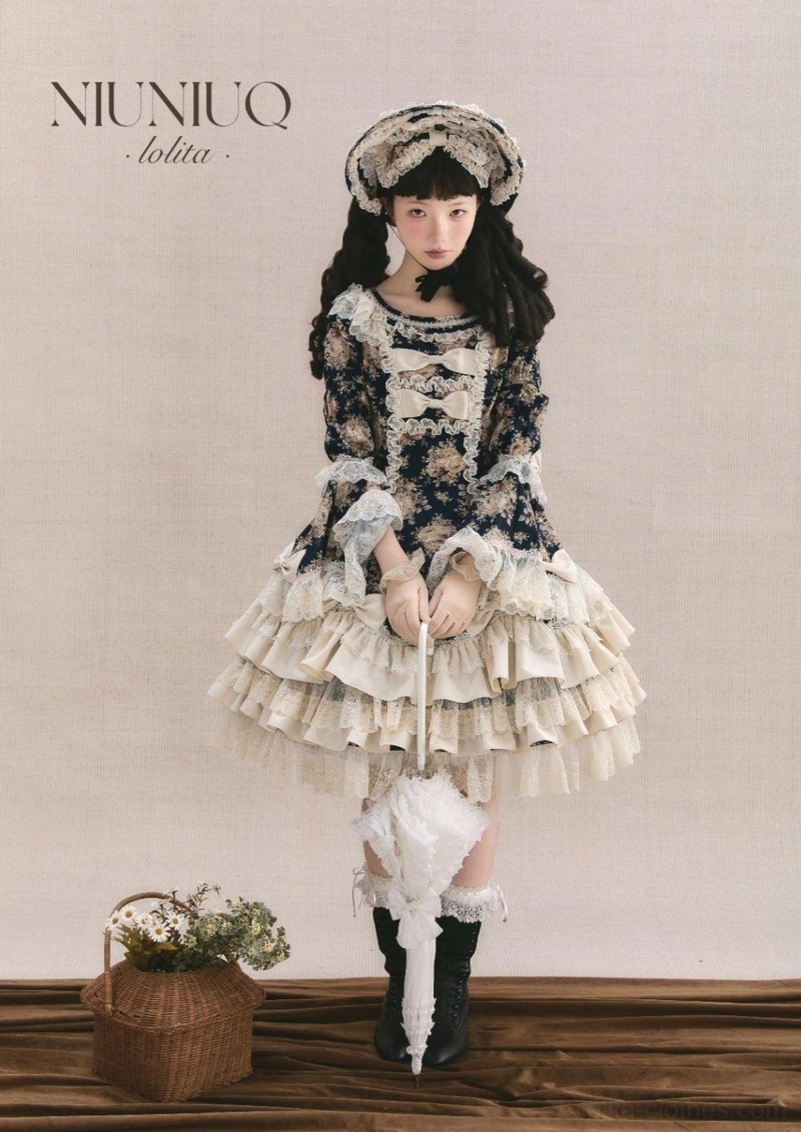 Long-sleeve floral Lolita OP dress front view with matching bonnet, layered ruffled skirt, and vintage aesthetic