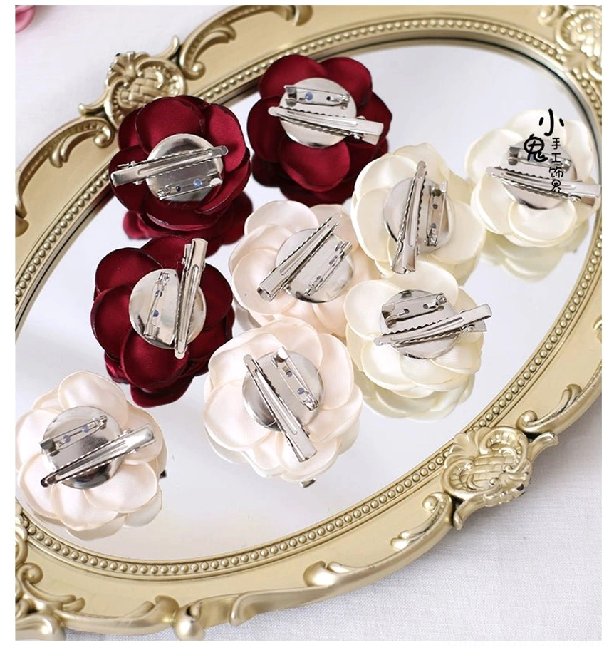 Rose red fabric rose brooch and hair clip dual-purpose accessory with secure clip backing and brooch pin mechanism design