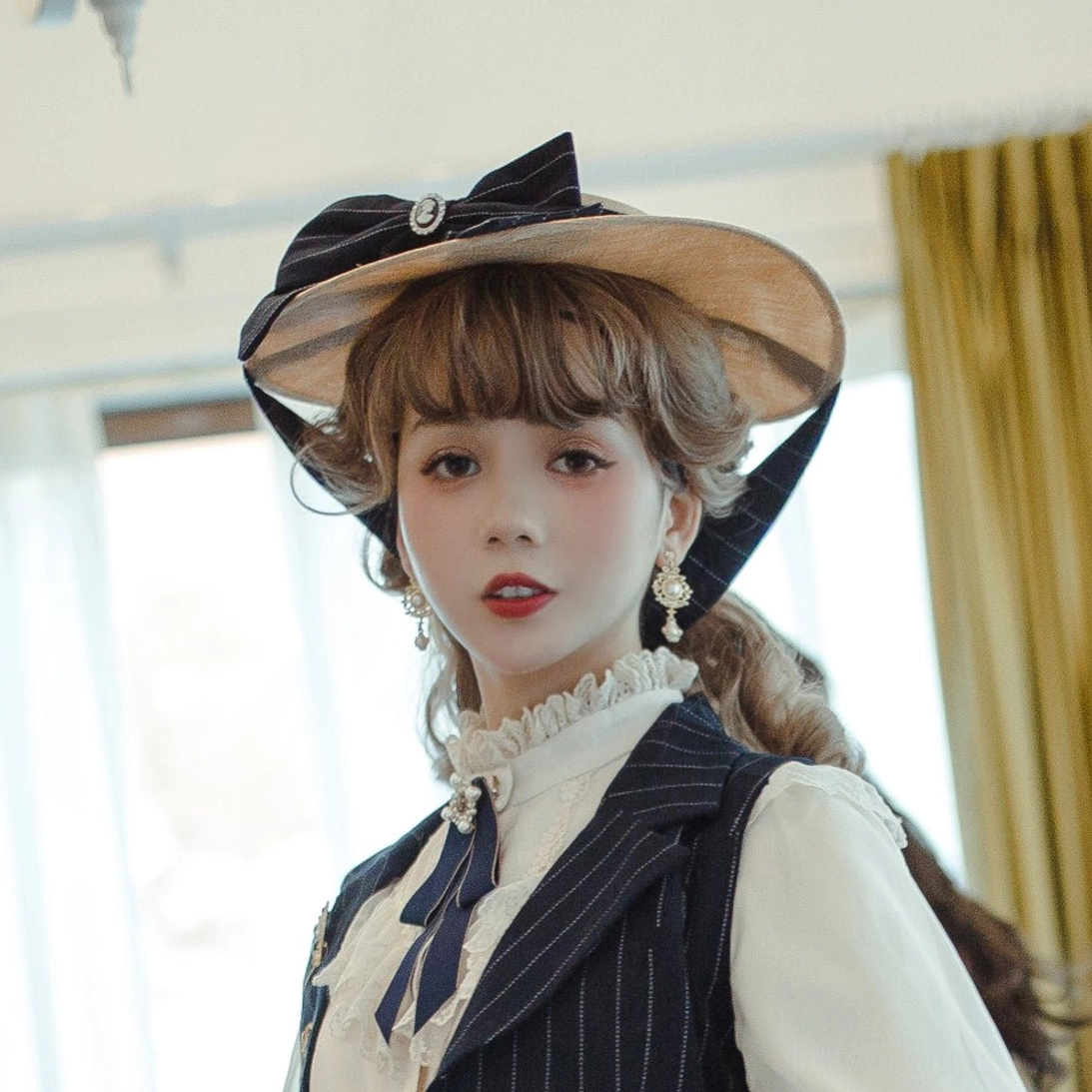 Rose silhouette lolita flat hat in alternative color variation, artistic close-up of the cameo medallion and ruby gemstone focal point details