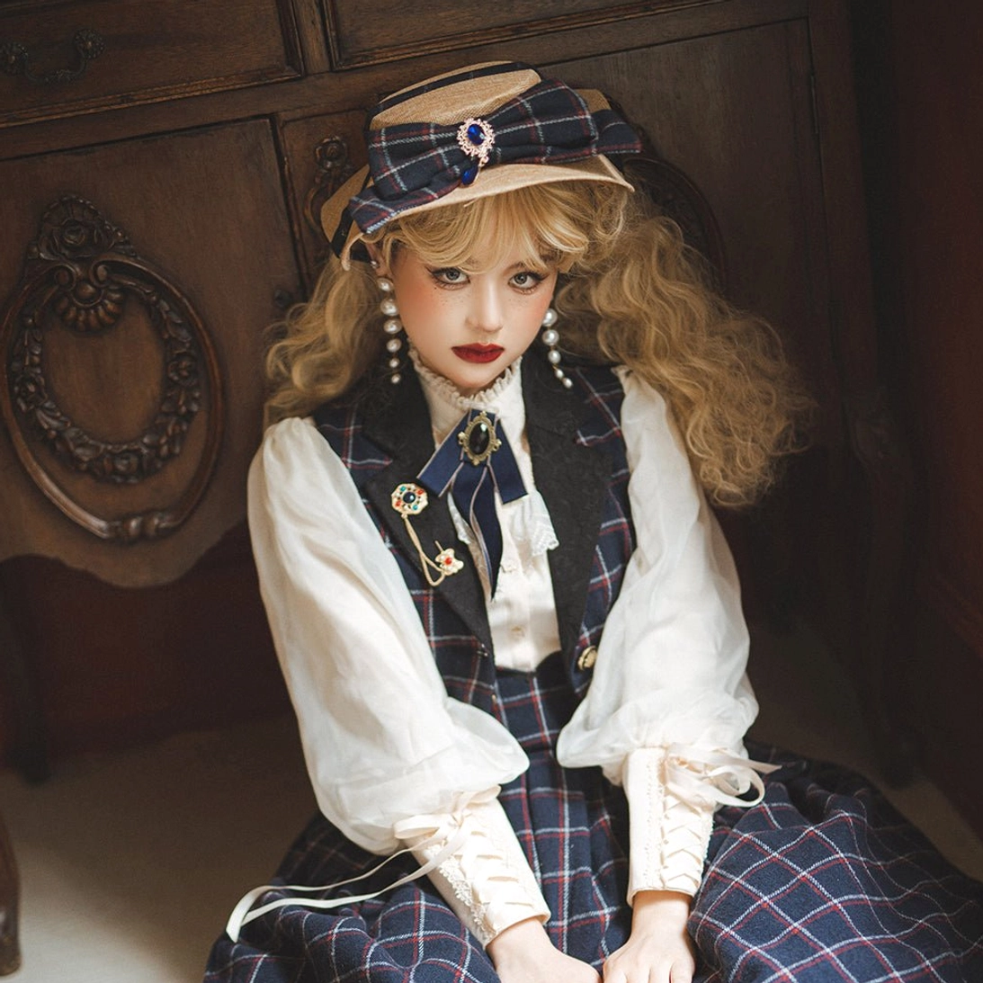 Classic lolita flat hat with dimensional bow and jeweled centerpiece, three-quarter profile showcasing the refined Victorian-inspired design and metal decorative details